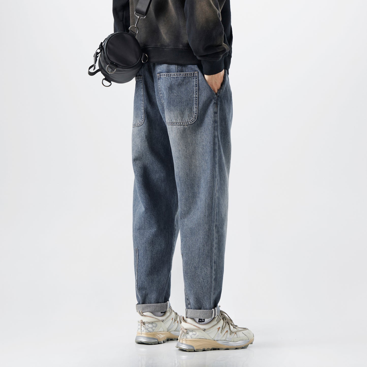 Lösa avsmalnande byxor för män