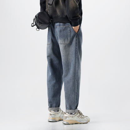 Lösa avsmalnande byxor för män